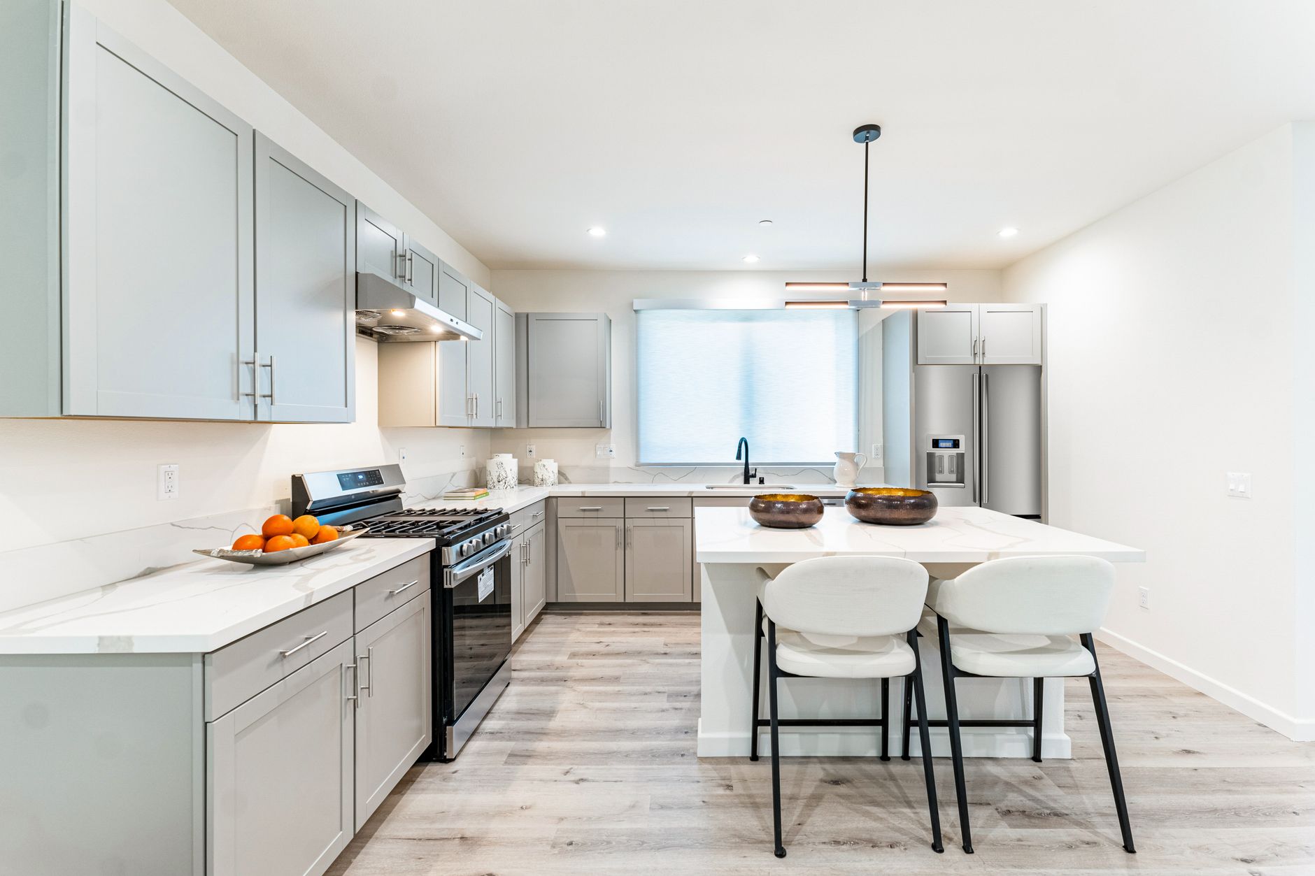 Bright and spacious contemporary kitchen with minimalist style and luxury features